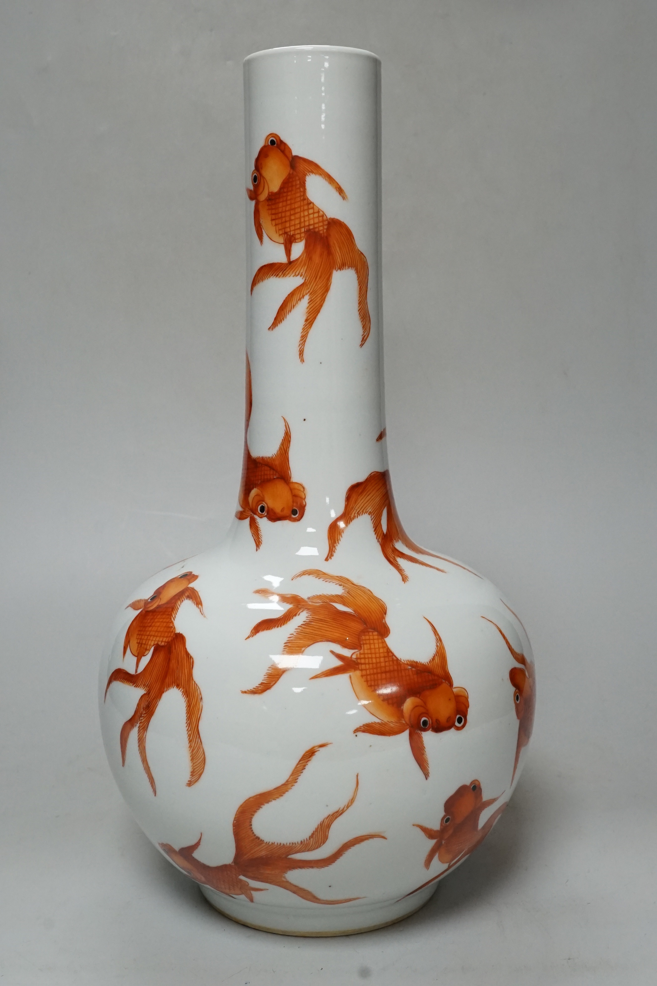 A Chinese iron red enamelled ‘goldfish’ bottle vase, 36cm tall